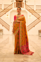 Load image into Gallery viewer, Mustard Patola Printed Banarasi Silk Saree With Tassels