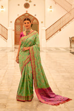 Load image into Gallery viewer, Green Patola Printed Banarasi Silk Saree With Tassels
