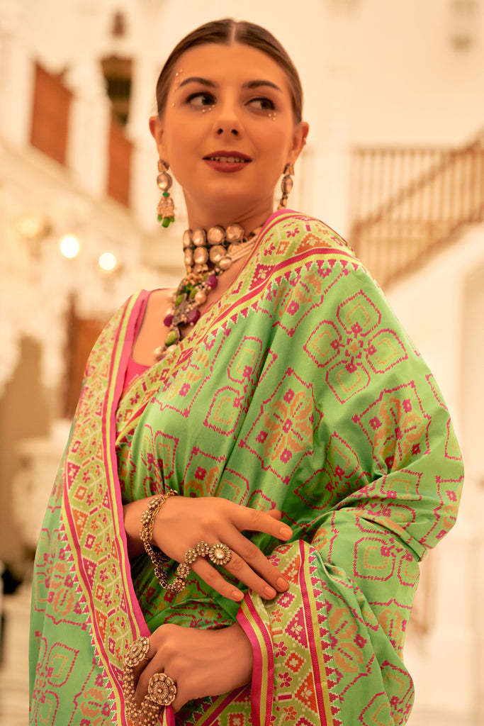 Green Patola Printed Banarasi Silk Saree With Tassels