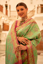 Load image into Gallery viewer, Green Patola Printed Banarasi Silk Saree With Tassels