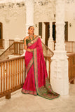 Rani Pink Patola Printed Banarasi Silk Saree With Tassels