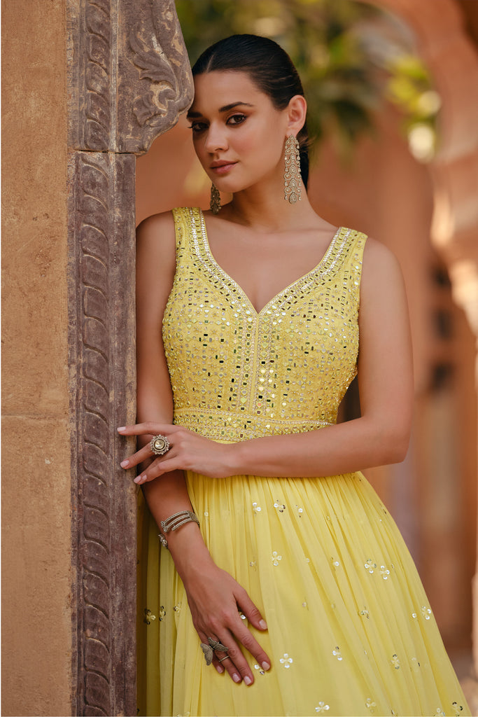 Party Wear Bright Yellow Georgette Gown With Net Dupatta
