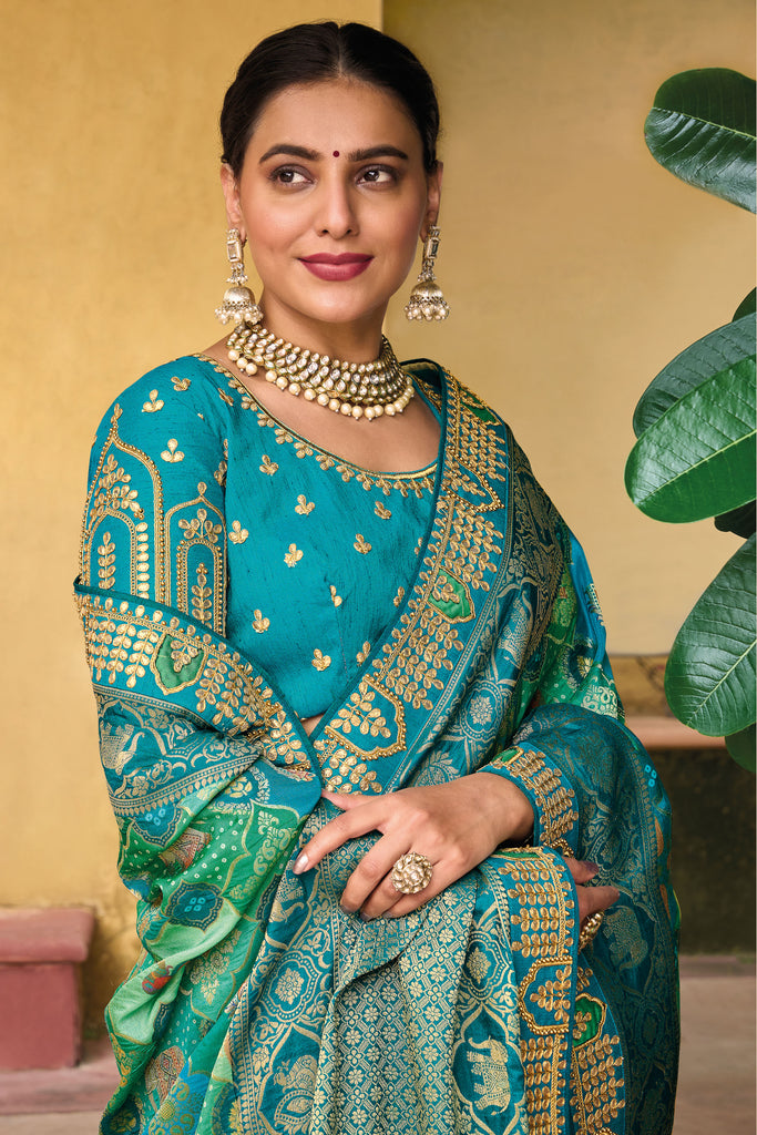 Teal Blue Zari Woven Handwork Embroidery Dola Silk Saree With Blouse