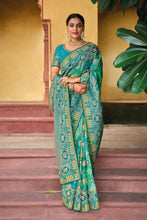 Load image into Gallery viewer, Teal Blue Zari Woven Handwork Embroidery Dola Silk Saree With Blouse