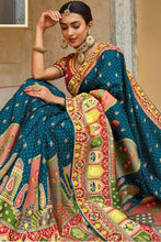Load image into Gallery viewer, Peacock Blue Zari Woven Handwork Embroidery Dola Silk Saree With Blouse