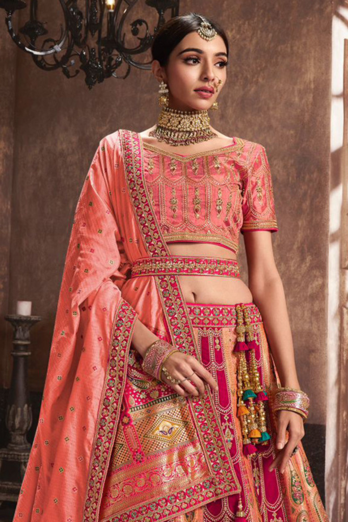 Peach and Pink  Banarasi Silk Heavy Embroidered Lehenga Choli